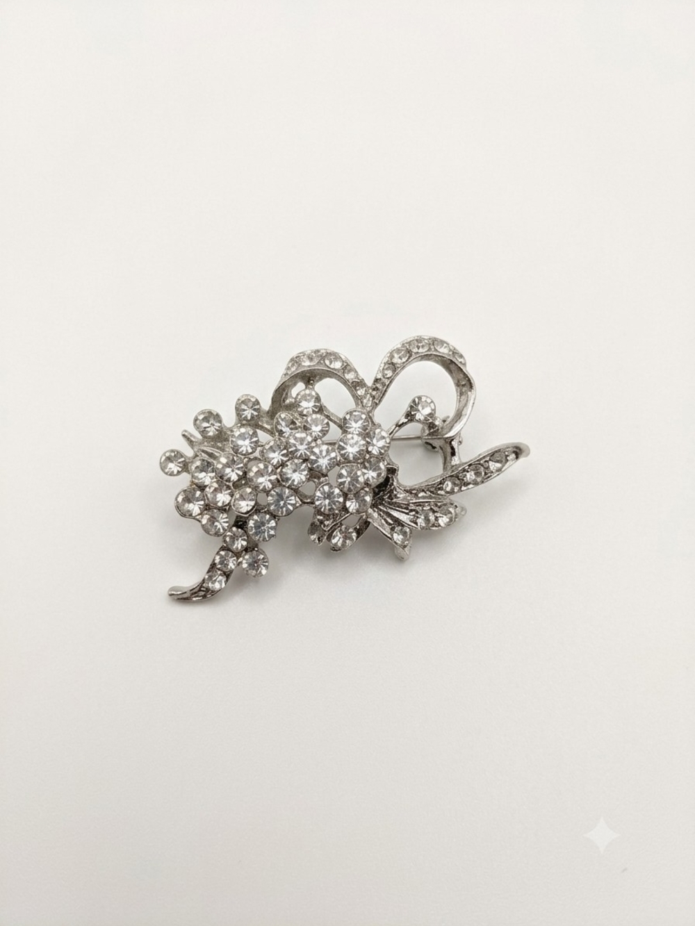 Silver Crystal Floral Bow Brooch - Elegant Sparkling Accent